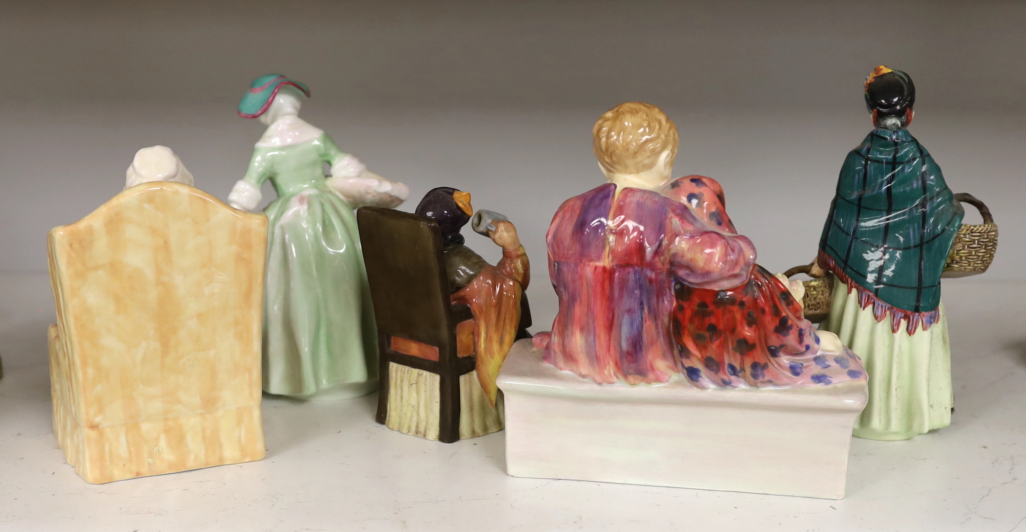 A group of five Royal Doulton figures, including Flower Sellers Children H.N. 1342, 19.5cm high